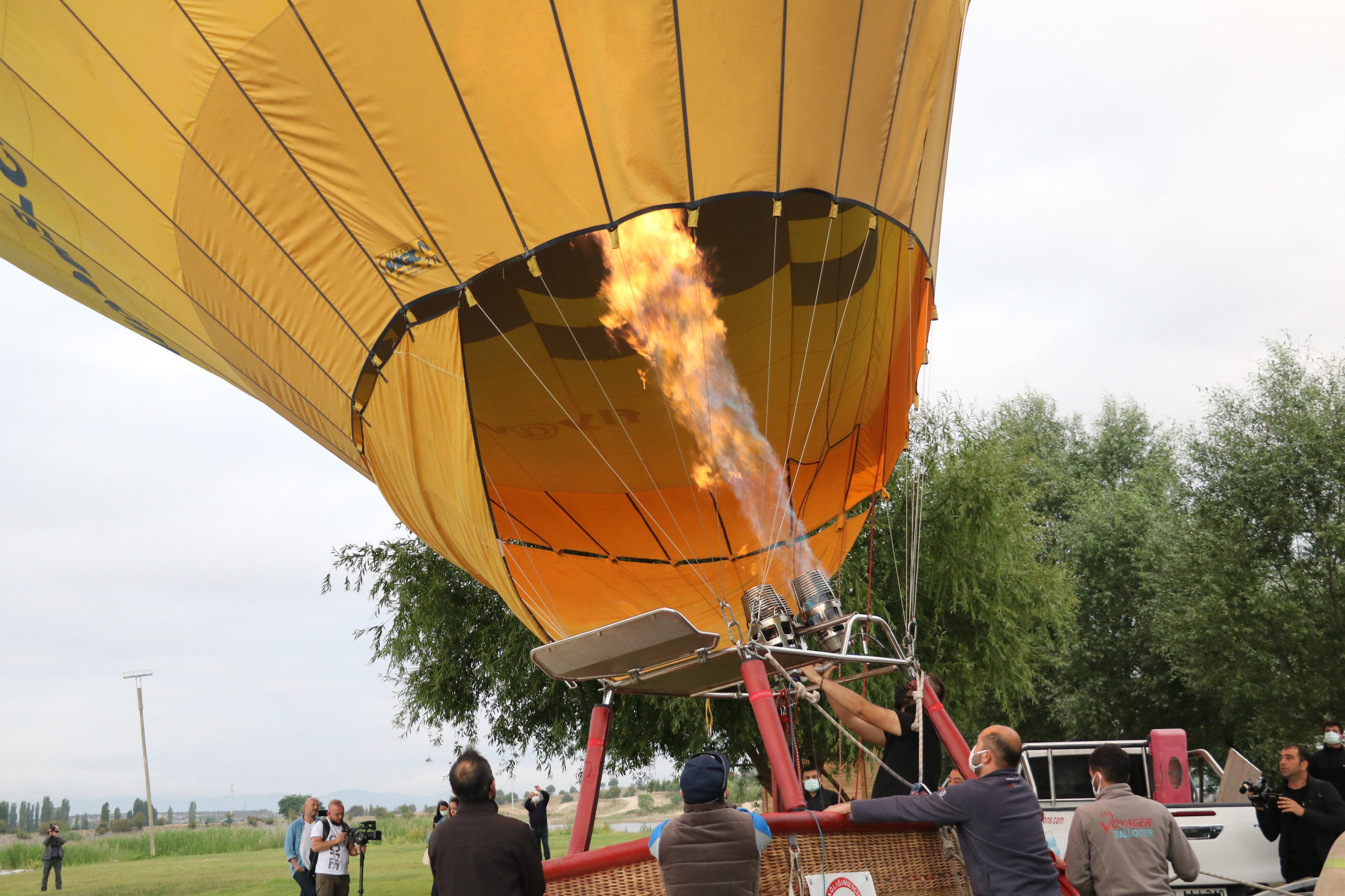 The first hot air balloon took off in Emre Lake in Afyonkarahisar City