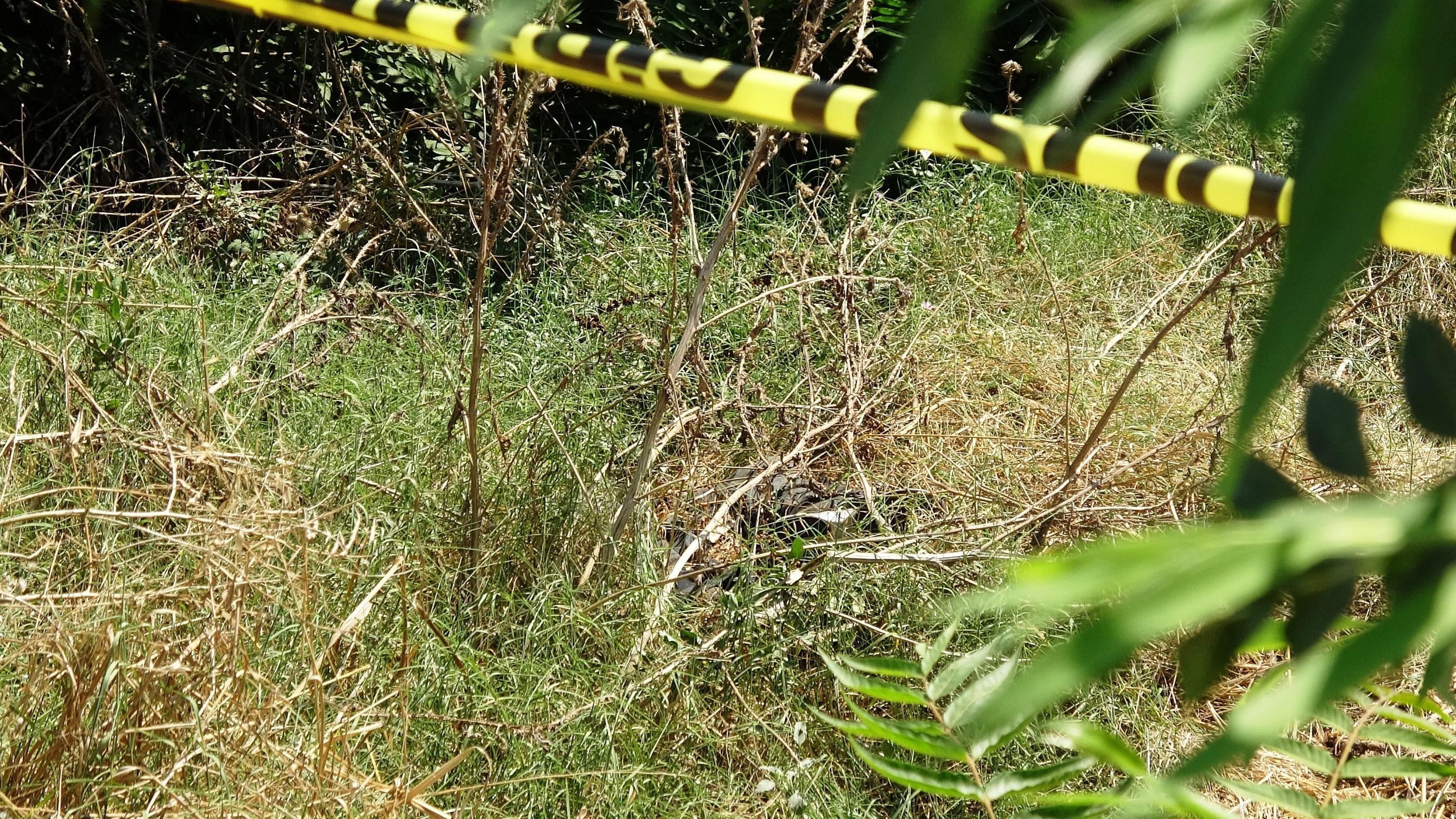 Çöp sandığı ayakkabıyı almak isterken ceset buldu