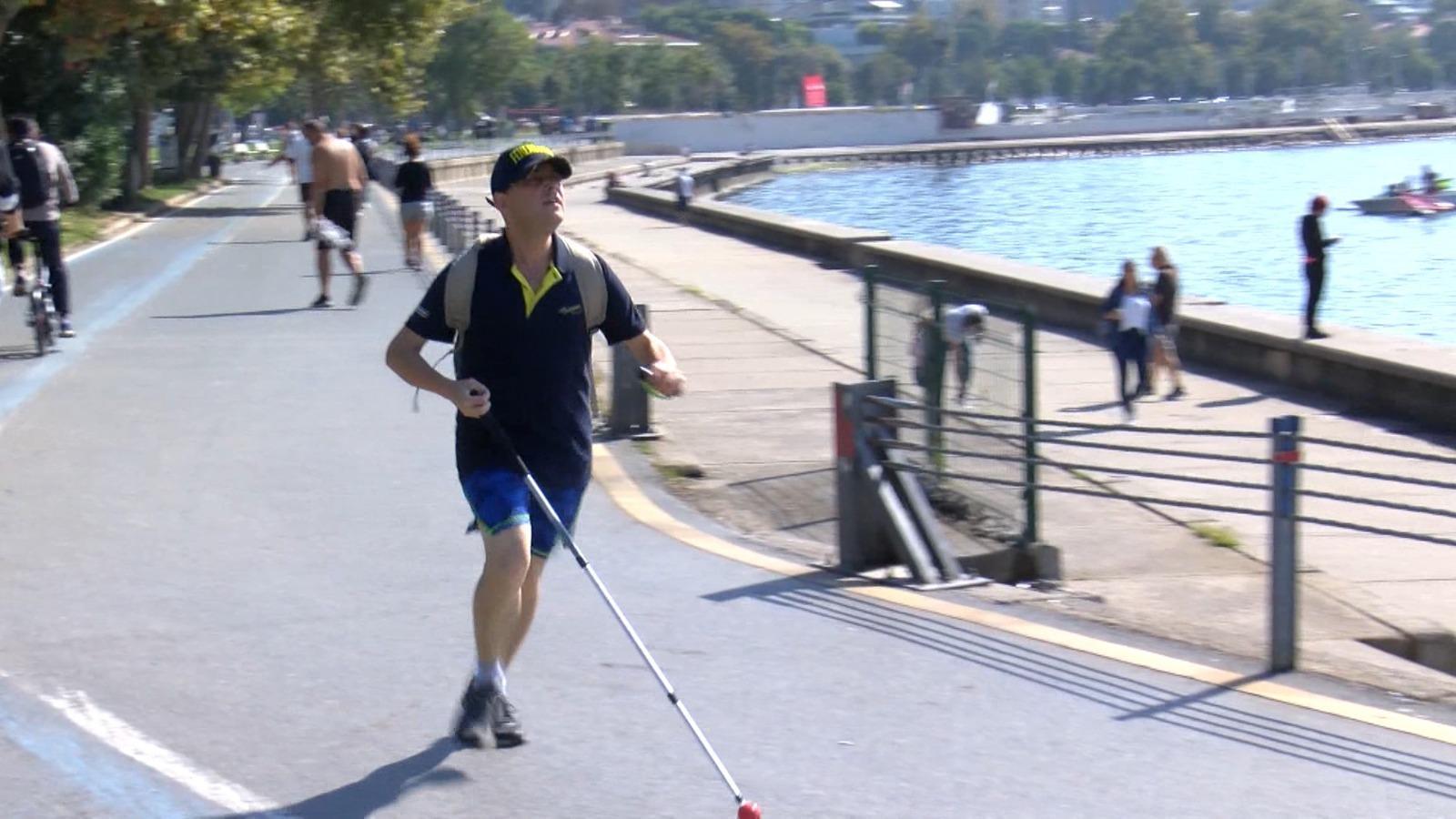 Runs 14 kilometers a day with his cane and bell despite his visual impairment