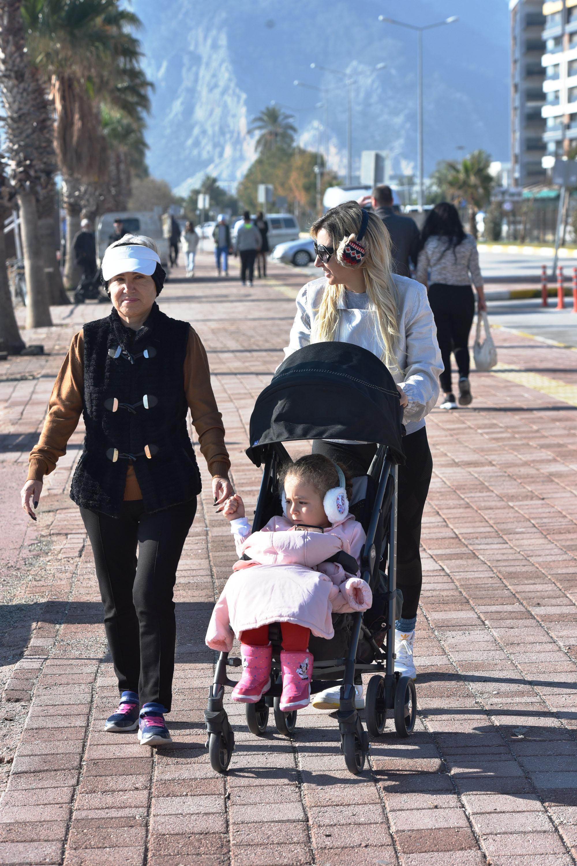 Tourists enjoyed swimming on the first day of the year in Antalya