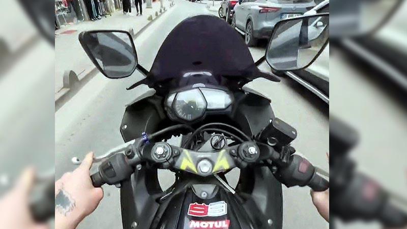 Tek tekerlek üzerinde ilerleyen motosikletin sürücüsüne 71 bin lira ceza