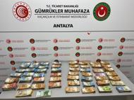 Antalya Havalimanı'nda bebek bezleri içine gizlenmiş 381 bin 750 avro ele geçirildi