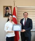 Kaymakam Türker'den öğretmenlere başarı belgesi