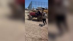Tartıştığı ailenin üzerine traktör sürdü; o anlar kamerada