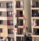 Balkondan düşmek üzere olan kız çocuğunu katları tırmanarak kurtardı