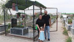 Ölen kızlarının hatıraları çalınınca mezarının etrafını çitle çevirip, kapı yerleştirdiler