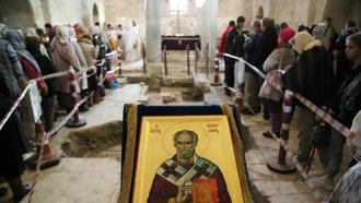 Saint Nicholas, known as 'Santa Claus', was commemorated with mass