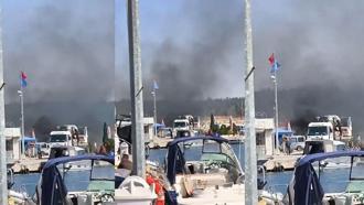 Tuzla'da balıkçı barınağındaki lastiklerde çıkan yangın söndürüldü