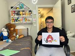 Özel gereksinimli Atakan'ın hafızası, karikatür yeteneğiyle birleşti