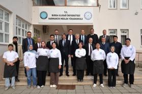 BUÜ yönetiminden Keles ve Harmancık ziyareti