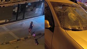 Taşla park halindeki otomobiller ile iş yerlerinin camlarını kırdı