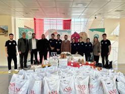 Üniversitelilerden ihtiyaç sahibi ilkokul öğrenicilerine bot ve mont desteği