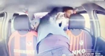 Taksi şoförünün, şüphelinin tüfeğini almaya çalıştığı anlar araç içi kamerasında