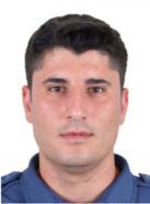 Şehit polis memurunun babaevine Türk bayrağı asıldı