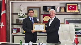 Kaymakam Muhammet Güzel'e ‘fahri hemşehrilik’ beratı verildi