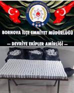İzmir'de polisten kaçan şüphelinin terk ettiği otomobilde 118 bin sentetik hap ele geçirildi