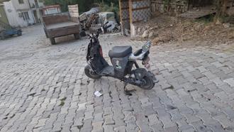 Kamyonete çarpan elektrikli bisikletten düşen çocuk yaralandı
