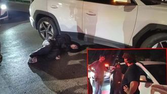 Otomobiliyle ters yöne giren sürücü polise direnip, gazetecilere tükürdü