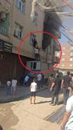 Yangında mahsur kalan kadını konteynerin üzerine çıkarak kurtardılar