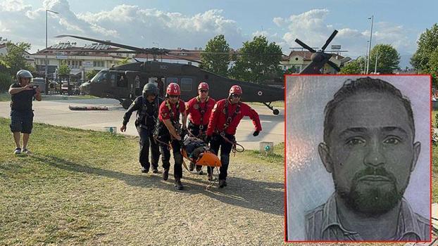 Paraşütle kayalıklara düşen turist, askeri helikopterle kurtarıldı