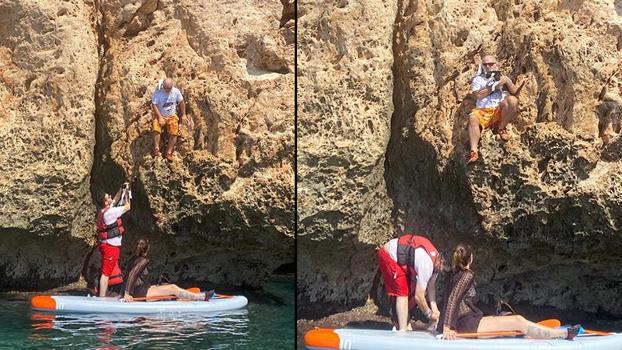 SUP board yaparken falezlerde mahsur kalan anne kediyi kurtardılar