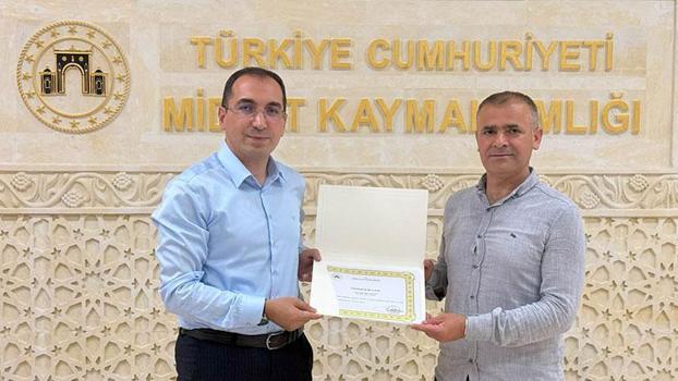 Midyat Kaymakamı Özdemir'den DHA muhabirine teşekkür belgesi