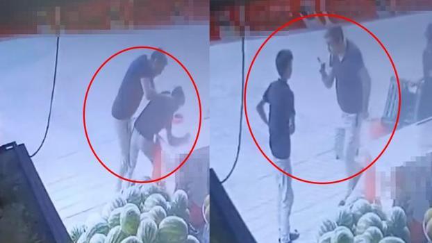 Bekçi, market çırağını darbetti; o anlar kamerada
