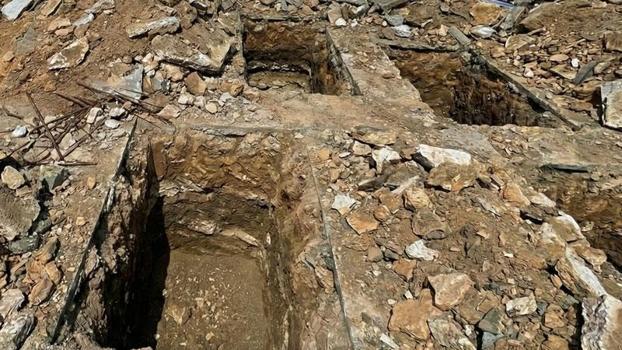 Suriye'de eski güvenlik merkezinde toplu mezar bulundu