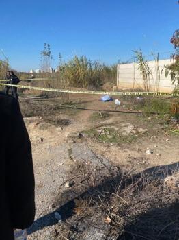 Adana'da yol kenarında kadın cesedi bulundu