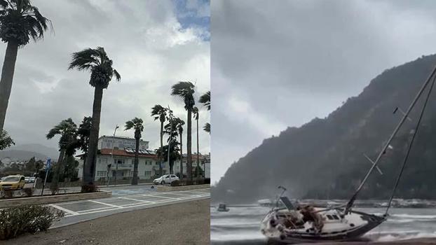 Marmaris’te fırtına; ağaçlar devrildi, yelkenli tekne karaya oturdu
