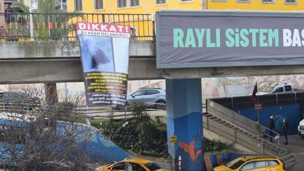 Kendisini dolandırdığını öne sürdüğü kişileri afişle teşhir etti