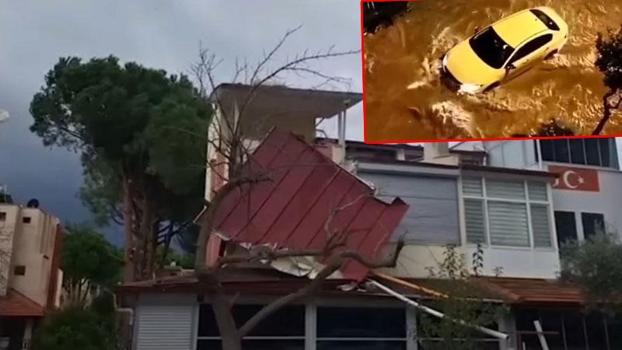 Kuşadası’nda fırtına ve sağanak: Evlerin çatıları uçtu, araçlar yollarda mahsur kaldı