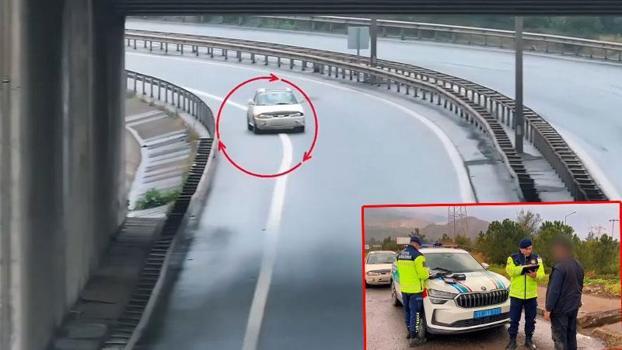 Otoyolda uygulama yapan polisleri görünce otomobili ile geri manevra yapıp, kaçtı
