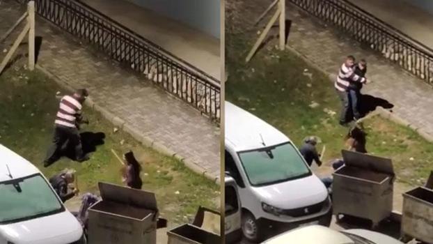 Evinin önüne gittiği eski eşiyle tartışan kişiyi, komşular sopayla dövdü; olay kamerada