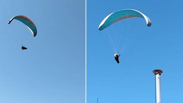 Mahallenin üstünden geçen paraşütçüyü çaya çağırdı