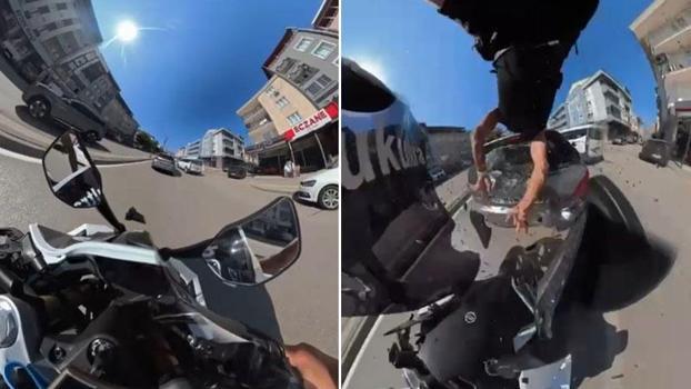 Otomobile çarpan motosikletin sürücüsü, metrelerce savruldu; kaza kask kamerasında