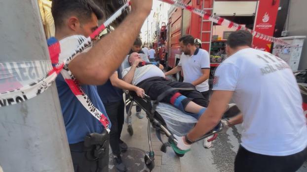 Şişli'de iş yerinde çıkan yangında 1'inci kattan atlayan kişi yaralandı