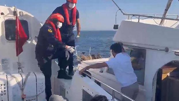 Didim açıklarında 3'ü çocuk 17 kaçak göçmen kurtarıldı; 1 gözaltı