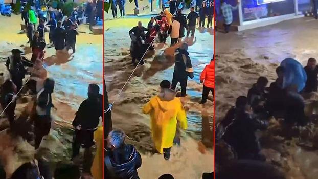 Sarıyer'de yollar göle döndü; sokağa halat gerip karşıya geçtiler