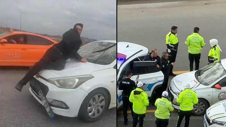 Sürücü kurusu eğitmeni, tartıştığı kişiyi kaput üzerinde 20 kilometre sürükledi