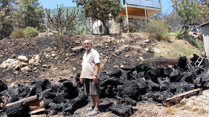 Emekli itfaiyeci evini yanmaktan kurtardı