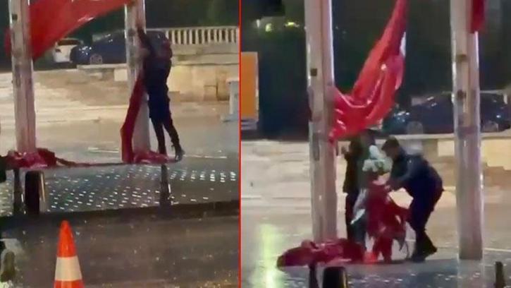 Taksim Meydanı'nda yere düşen Türk bayrağını polis kaldırdı
