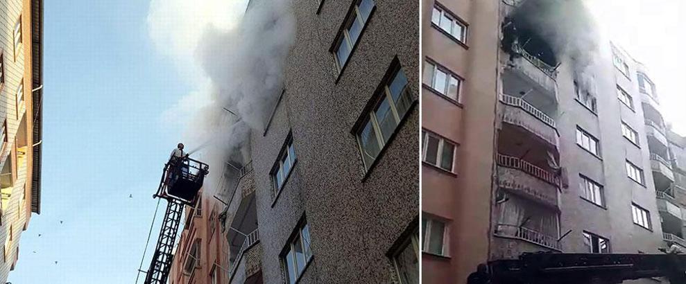 Yangında 4'üncü kat balkonundan sarkan ev sahibini itfaiye kurtardı