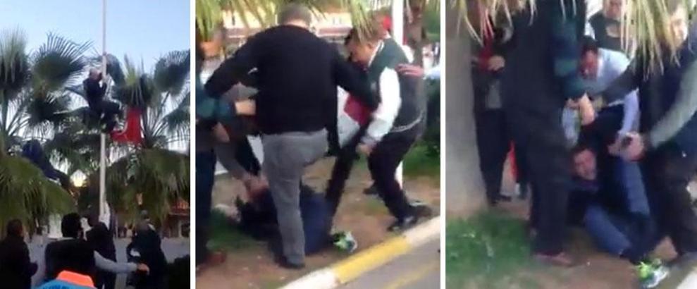 Türk bayrağını indirmeye çalışınca linç edilmek istendi