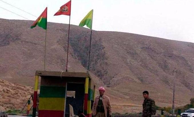 Irak ordusundan Sincar'da operasyon: PKK ve YBŞ sembolleri kaldırıldı