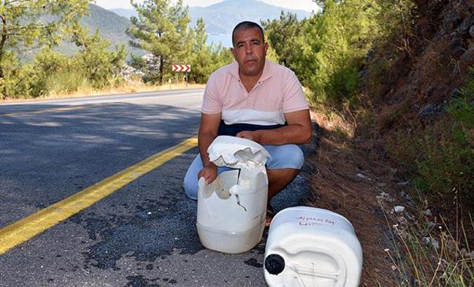 Yangına müdahale için bırakılan su bidonlarını kırmışlar
