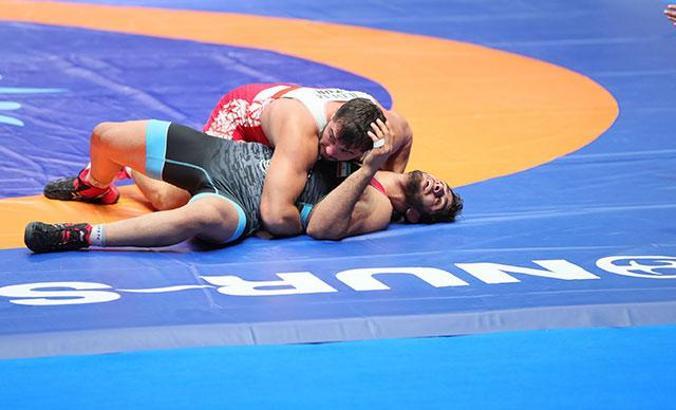 Milli güreşçi Cenk İldem dünya üçüncüsü oldu