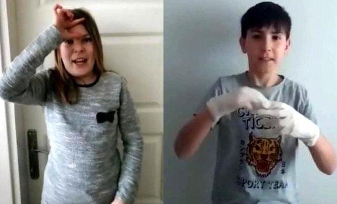 Kursiyerlerden işaret diliyle 'evde kal' mesajı