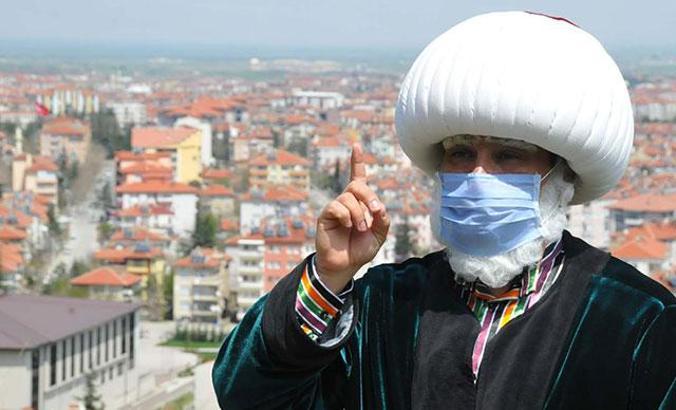 Temsili Nasreddin Hoca'dan 'evde kal' çağrısı