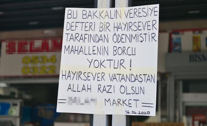 Mahallelinin veresiye defterindeki 7 bin liralık borcunu ödedi